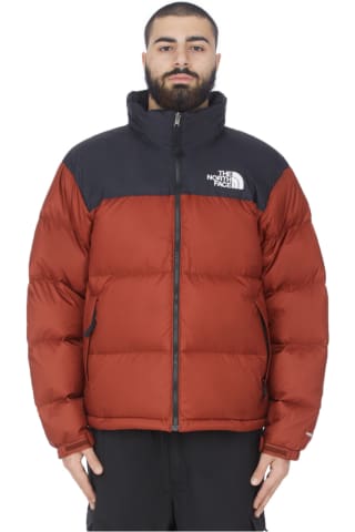orange north face puffer coat