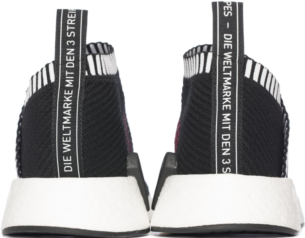 nmd cs2 triple black shock pink
